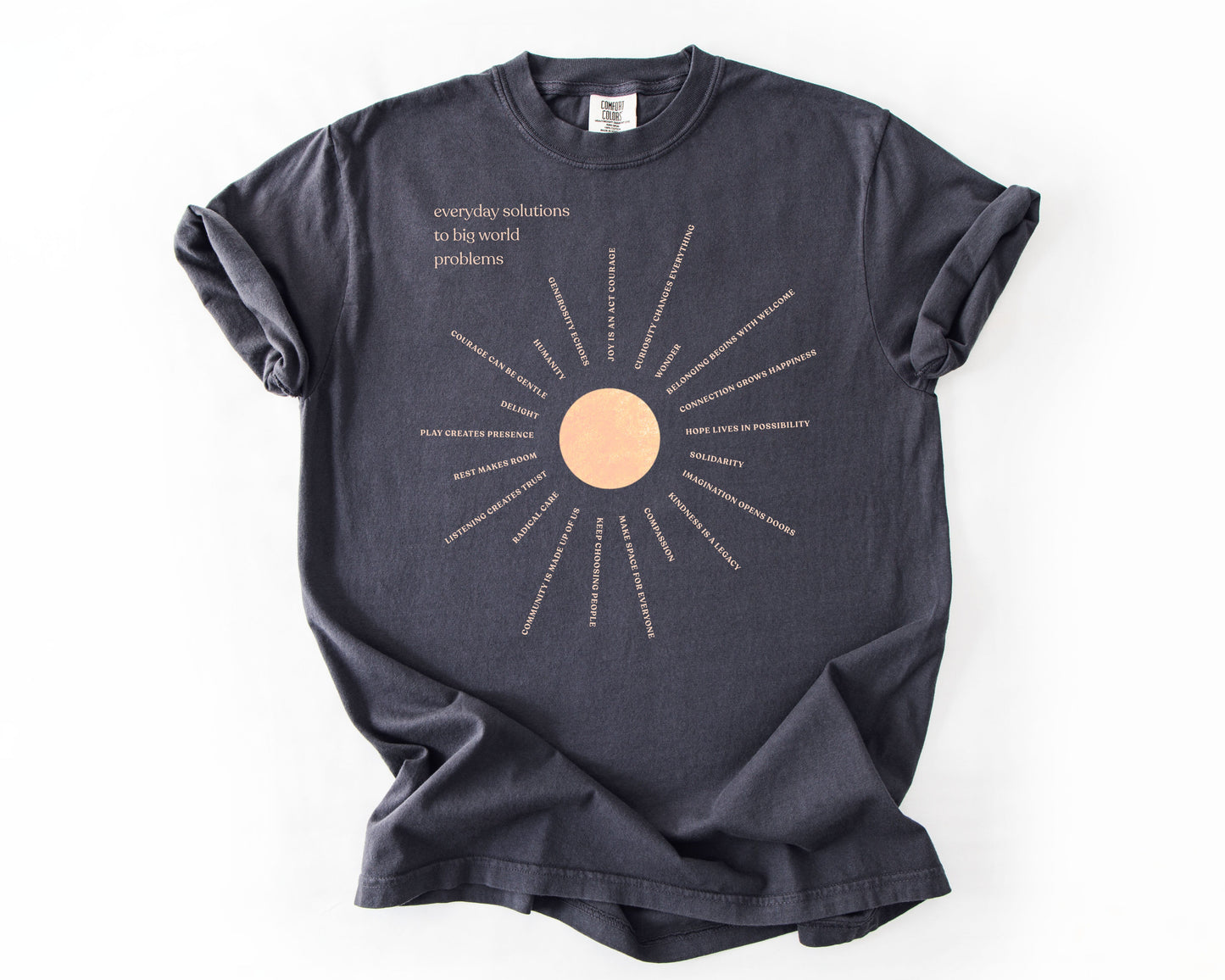 Everyday Solutions To Big World Problems | Community Graphic Tee