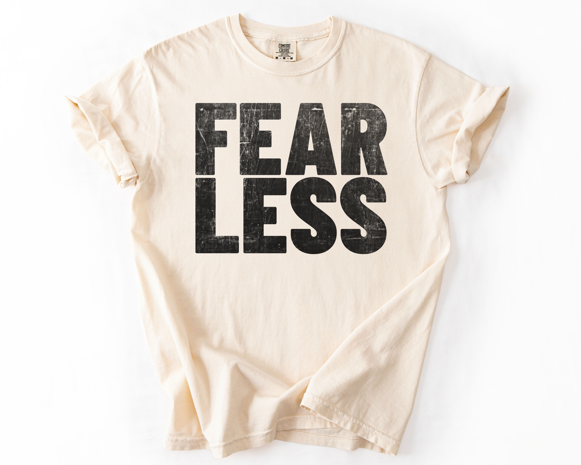 Ivory t-shirt with Fear Less graphic – social justice shirt