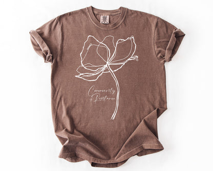Espresso t-shirt with Community Is Resistance botanical graphic – resistance shirt