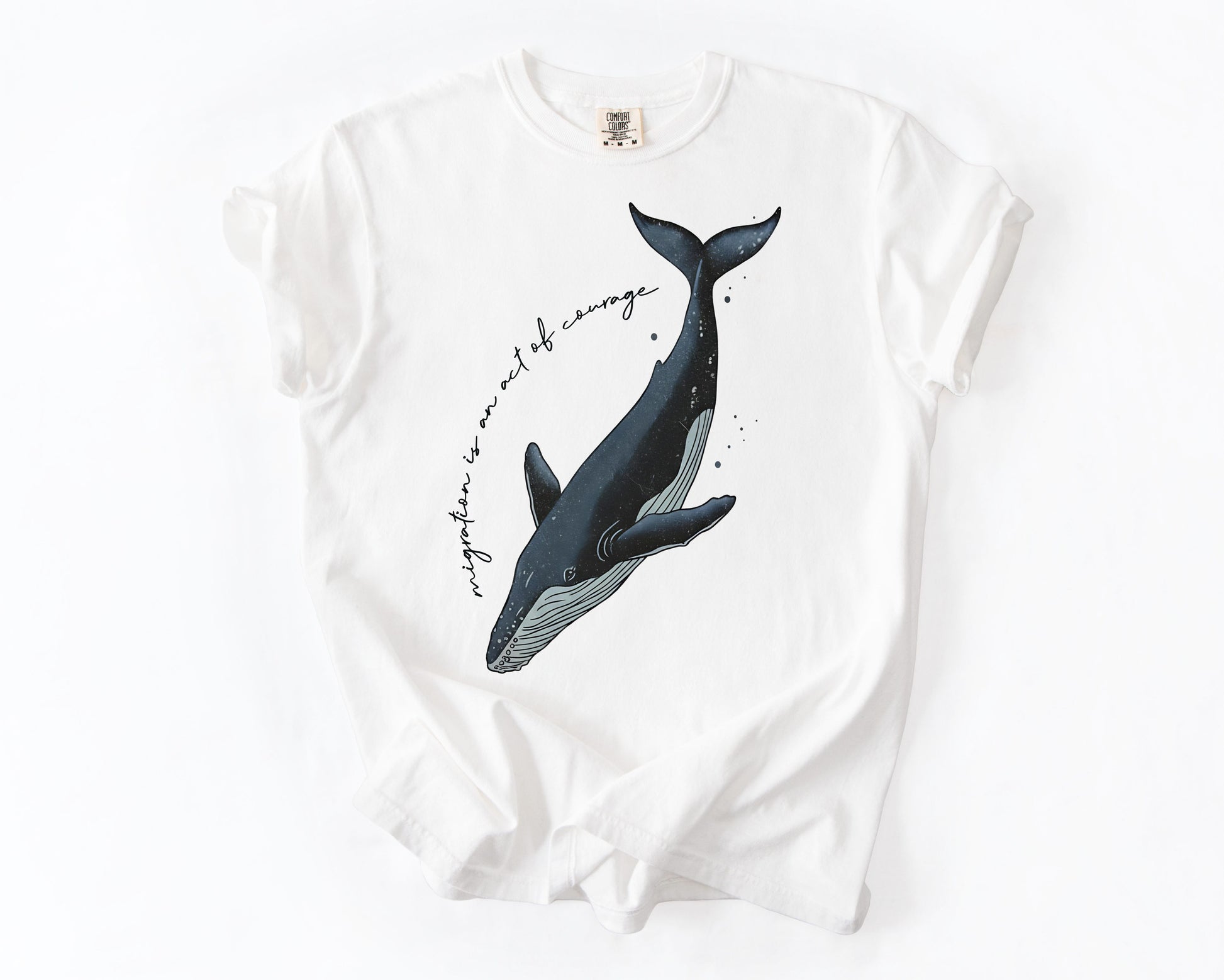White t-shirt with mother and calf whale migration graphic – human rights shirt