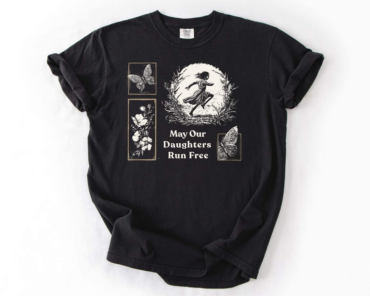 Black t-shirt with May Our Daughters Run Free botanical illustration – human rights shirt