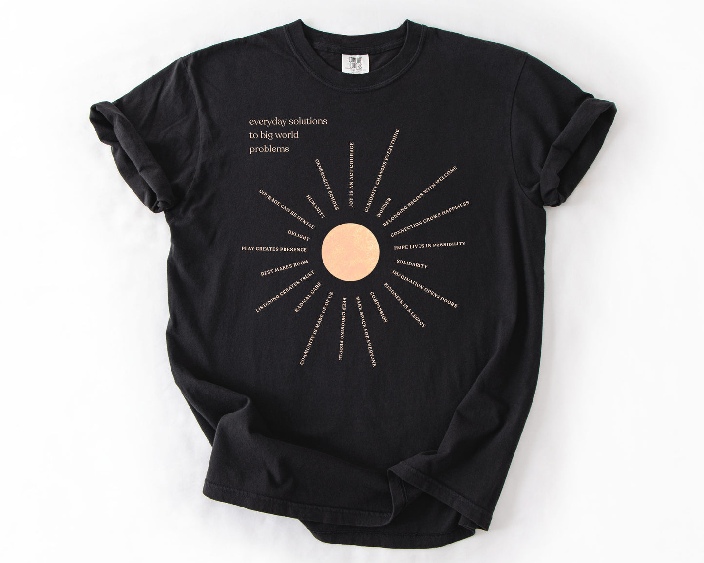 Everyday Solutions To Big World Problems | Community Graphic Tee