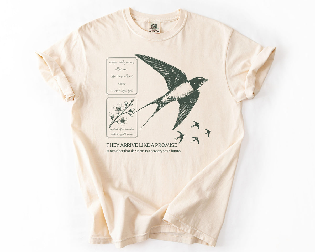 Ivory t-shirt with bird graphic – human rights shirt