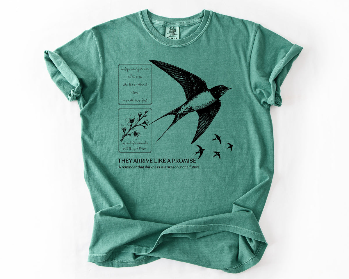 Light Green t-shirt with bird graphic – resilience
