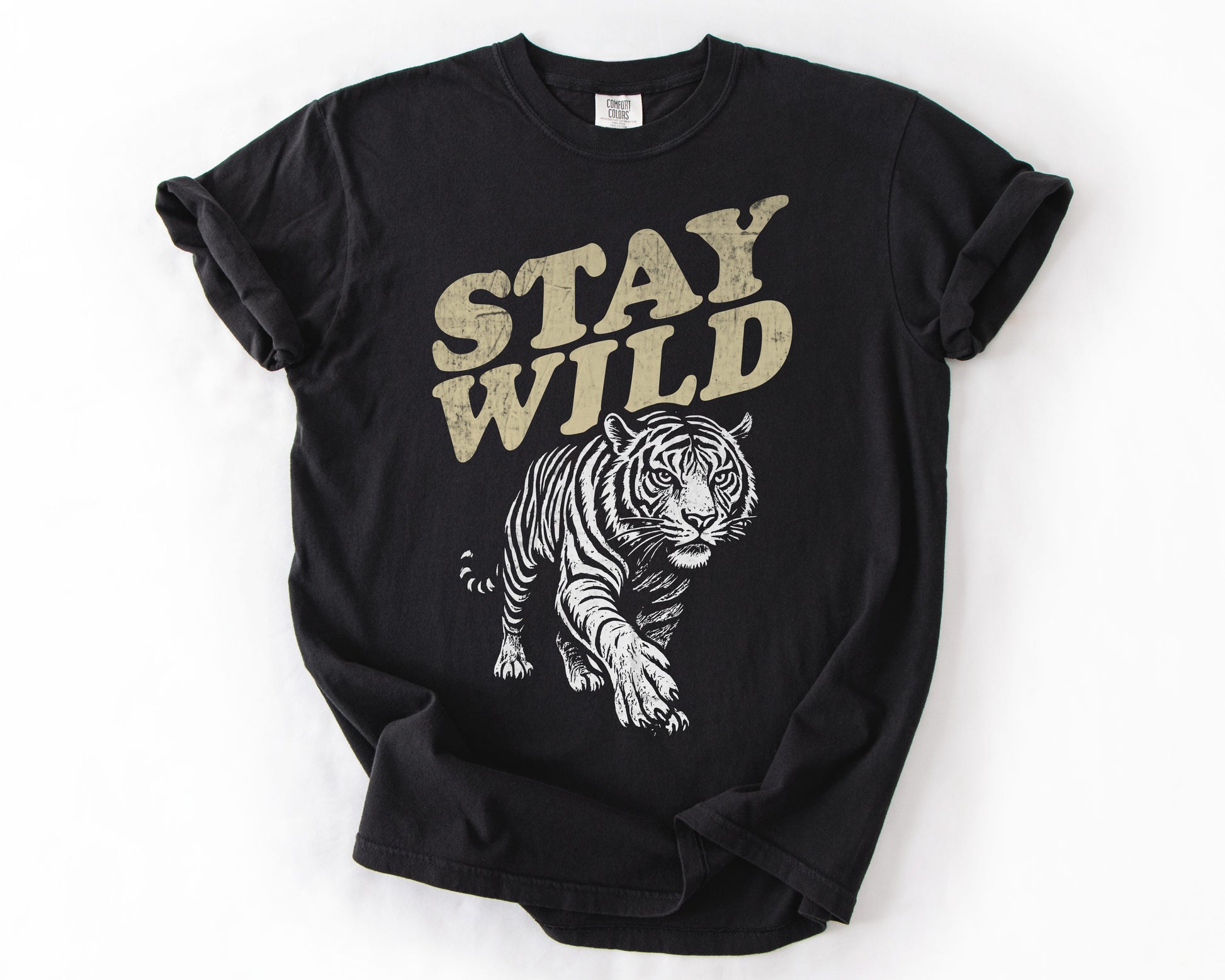 Black t-shirt with Stay Wild tiger graphic – women's rights shirt